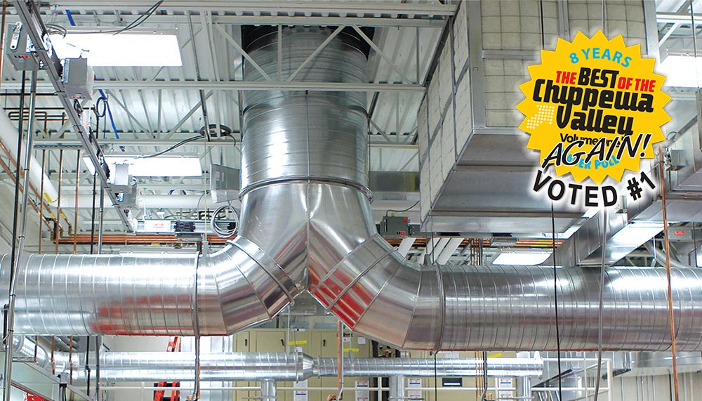 photo of large aluminum ducting installed at large industrial plant