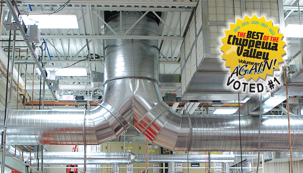 photo of large aluminum ducting installed at large industrial plant